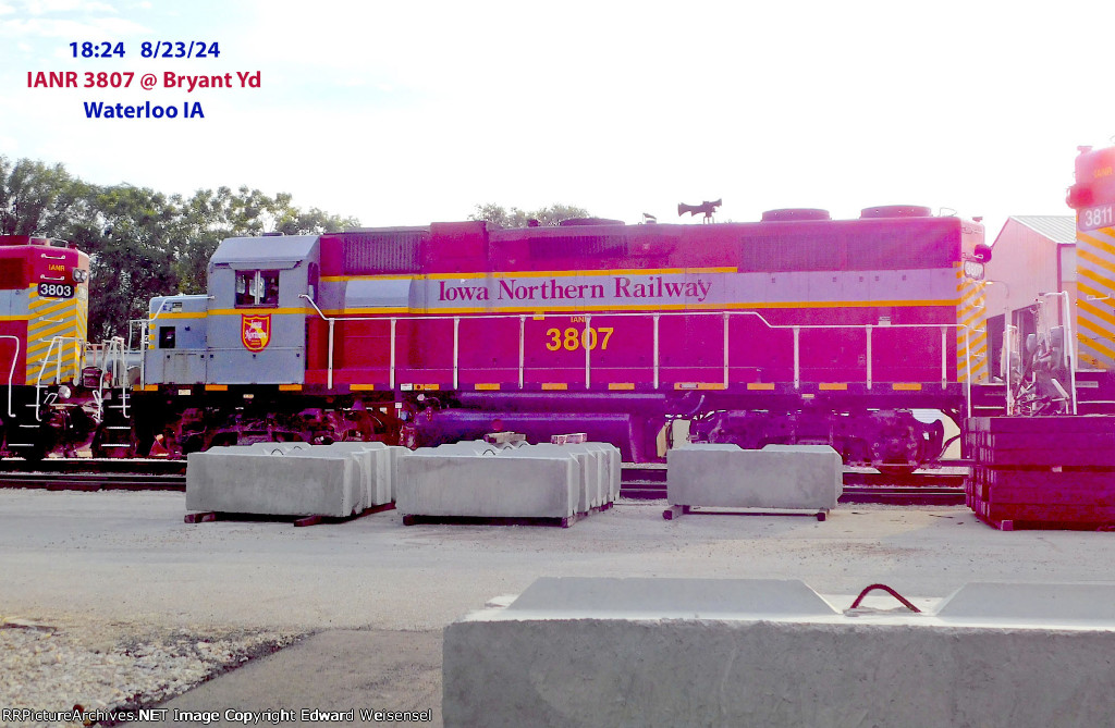 Three GP 38s visible in the yard